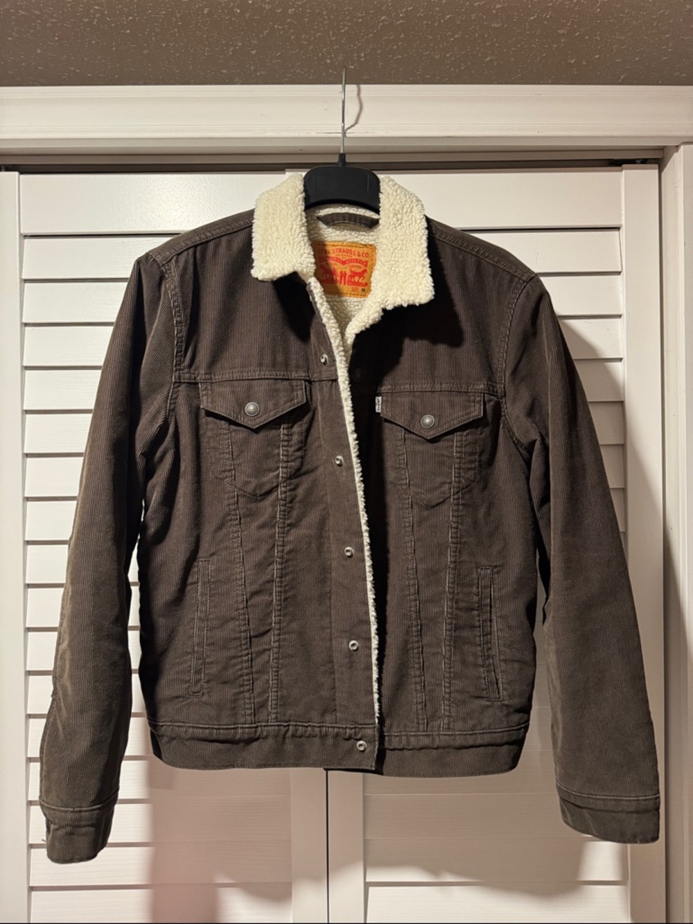 Levi’s brown corduroy sherpa trucker jacket size M